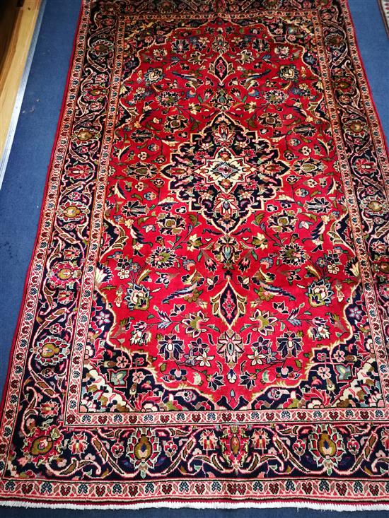 A Kashan carpet 240 x 143cm
